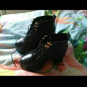 Black boots walked in once